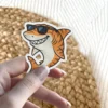 Cool tiger shark with sunglasses, scratch-resistant satin finish sticker.