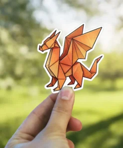 Origami dragon sticker showcases a gradient of warm oranges, a waterproof vinyl sticker perfect for laptops.