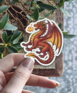 Red fire dragon art breathes flame on this waterproof vinyl sticker perfect for your laptop decal.