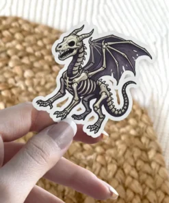 Skeleton dragon artwork features intricate bone details on this waterproof vinyl sticker.