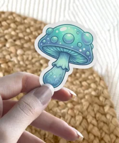 A whimsical blue mushroom sticker with glowing spots and bubbles.