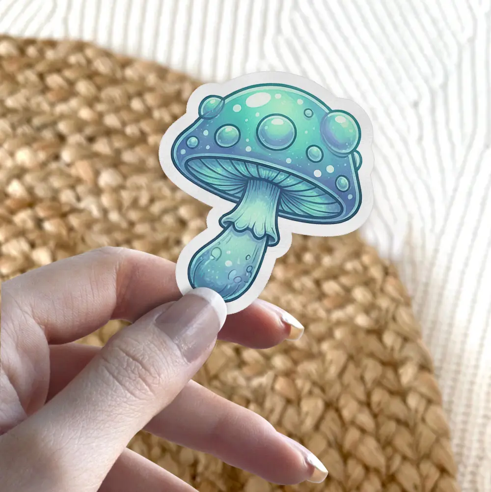 A whimsical blue mushroom sticker with glowing spots and bubbles.