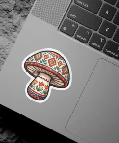 A boho-inspired mushroom sticker with intricate geometric patterns and floral accents.