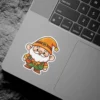 A cute cartoon gnome with a white beard wears an orange hat and a green tool belt with tools.