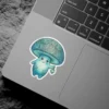 A cute, friendly blue mushroom character with a detailed, swirled cap and a small lantern is depicted on this vinyl sticker.