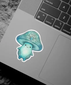 A cute blue mushroom character with a smiling face and a patterned cap adorned with a gem.