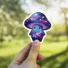 A whimsical mushroom character with a galaxy pattern and a happy face.