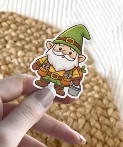 A cute cartoon handyman gnome with a green hat, a full tool belt, and a small bucket is ready to get to work.