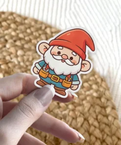 A cute cartoon handyman gnome with a big white beard, red hat, and a tool belt smiles cheerfully.