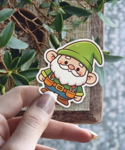 A cute cartoon gnome with a fluffy white beard, green hat, and a tool belt is smiling cheerfully.