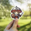A cartoon mushroom knight with an angry expression, wearing silver armor, holding a wooden shield and a small sword.