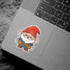 A cute gnome wearing a red hat and blue tunic with tool belt stands smiling.