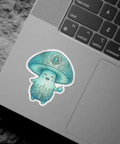 A cute teal mushroom character with a happy face, intricate mandala patterns, and a gemstone on its cap is depicted as a sticker.