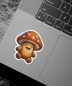 A cheerful, smiling mushroom character with a knitted texture and orange cap with white spots.