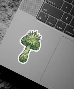 Green mushroom sticker featuring intricate botanical patterns and vibrant green leaves on its cap and stem.