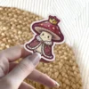 A cartoon mushroom wearing a crown and a regal robe, depicted as a king.