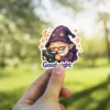 Cartoon gnome in a purple wizard hat sleeping peacefully, hugging a star-patterned pillow with 