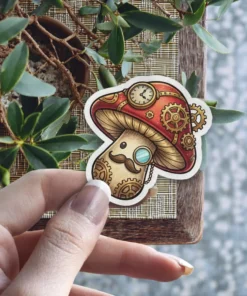 A whimsical steampunk mushroom character adorned with gears, a monocle, and a mustache, presented as a vinyl sticker.