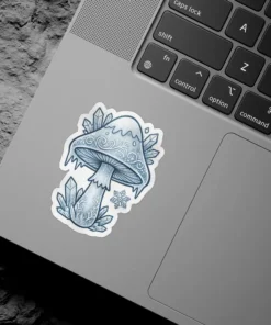 A whimsical sticker depicting a frosty mushroom adorned with crystals and a snowflake.