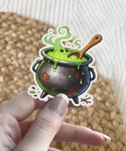 Rustic black cauldron, bubbling green potion, vibrant green steam, wooden stirring spoon, lime drips, vinyl sticker.