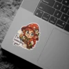 A chibi mushroom girl with red hair, glasses, and a mushroom cap hat pointing her finger and saying 'I'm reminding you!', vinyl sticker.