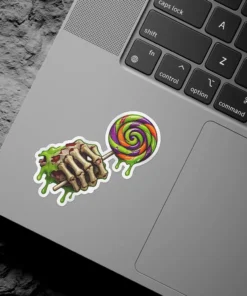Skeleton hand holding melted candy lollipop, dripping green slime, spooky aesthetic, horror themed vinyl sticker.