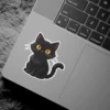 Fluffy black cat, expressive golden eyes, whimsical kitten illustration, die-cut vinyl sticker