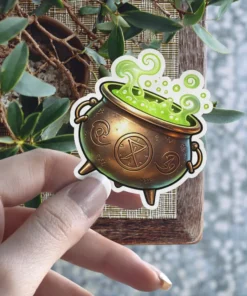 Detailed illustration of a bronze cauldron filled with glowing green potion, emitting swirling smoke and bubbles, mystical symbols adorn the cauldron, witchy vinyl sticker.