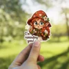A cute anime-style fairy with a mushroom hat, glasses, and braids gestures with her finger while saying 'I'm reminding you!' vinyl sticker.