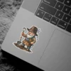 A detailed illustration of a cheerful gnome wearing a brown hat and apron, holding a shovel and keys.