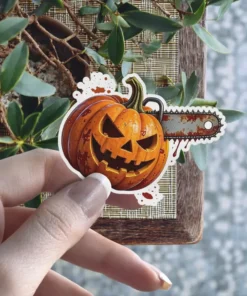 A spooky, carved jack-o-lantern with a rusty chainsaw running through it and blood splatters. This durable vinyl sticker is perfect for laptops or water bottles.