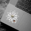 Intricate spider web, dew drops, centered human skull, crawling spider, dark gothic art, vinyl sticker