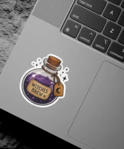 Stylized illustration of a clear bottle filled with sparkling purple 'Witches Brew' potion, cork stopper, crescent moon charm, vinyl sticker.
